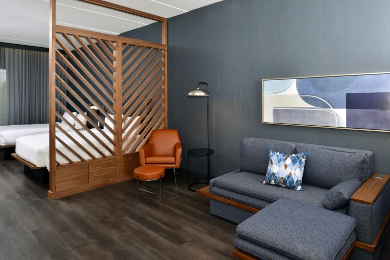 The beds and lounge in a Courtyard Cary suite
