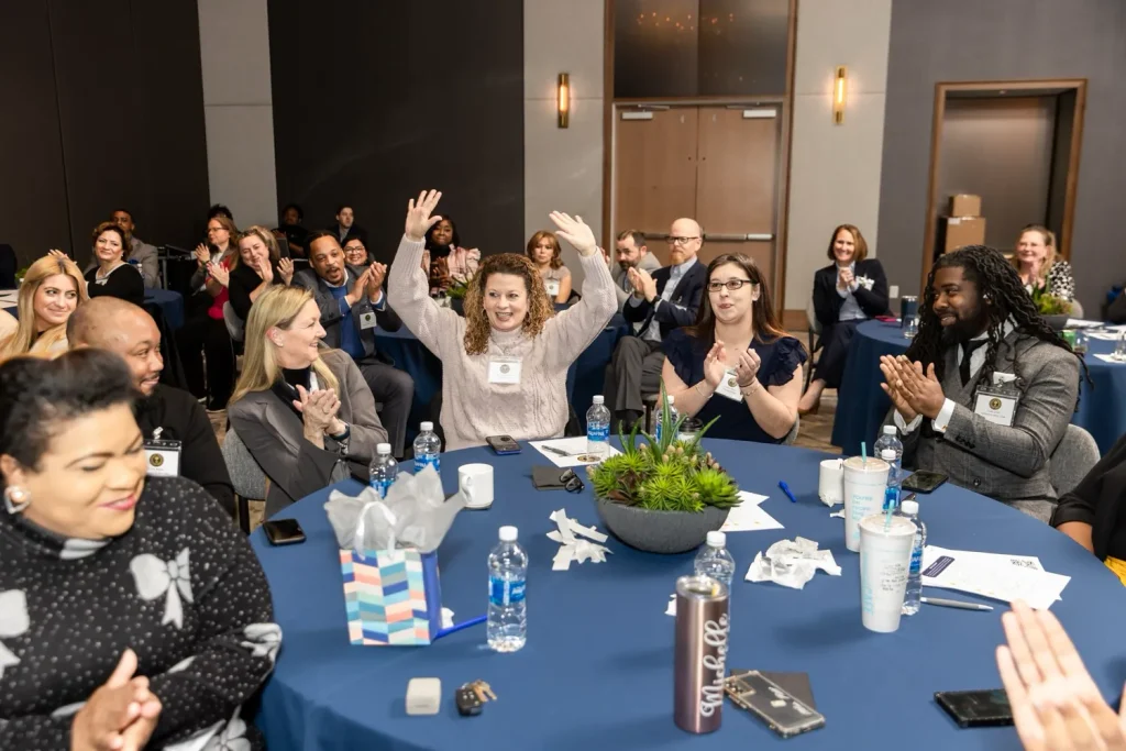 CMC team members celebrating together at Hallmark of Hospitality