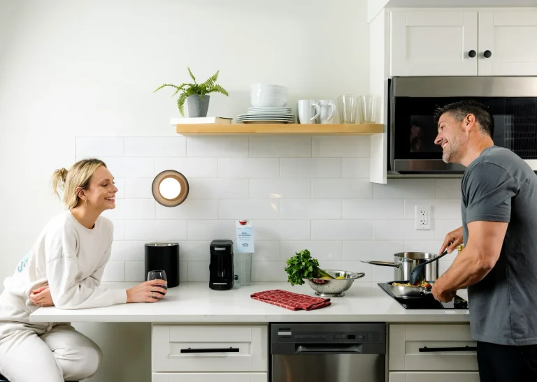 Guests sharing a meal in a Hive House suite