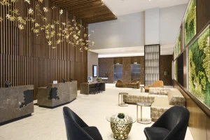The lobby at The Westin Raleigh-Durham Airport, with sculptural lighting and a living green wall